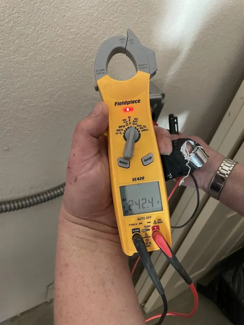 Voltage testing with clamp meter during Hot Tub / Pool Electrical Wiring in Lisle